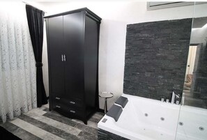 Shower, hair dryer, towels, soap