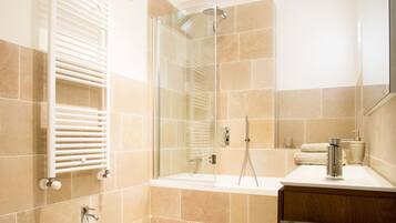 Combined shower/tub, jetted tub, hair dryer, bidet