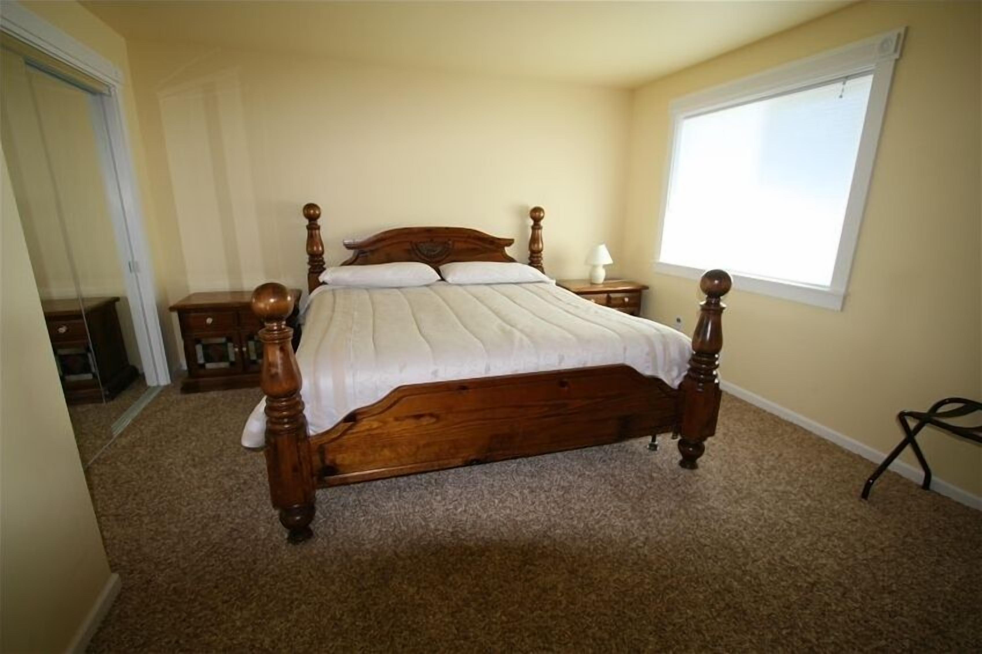 One of our King bedrooms, they are all beautiful! WETLAND VIEW