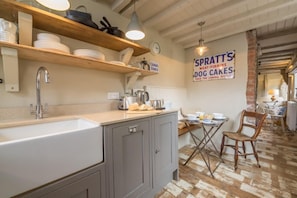 Fridge, oven, dishwasher, dining tables
