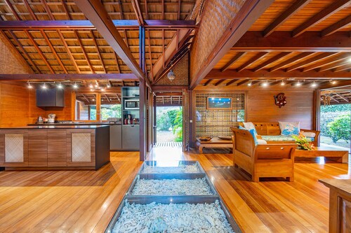 Balinese style wooden house just steps from the beach