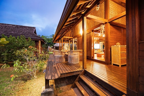 Balinese style wooden house just steps from the beach