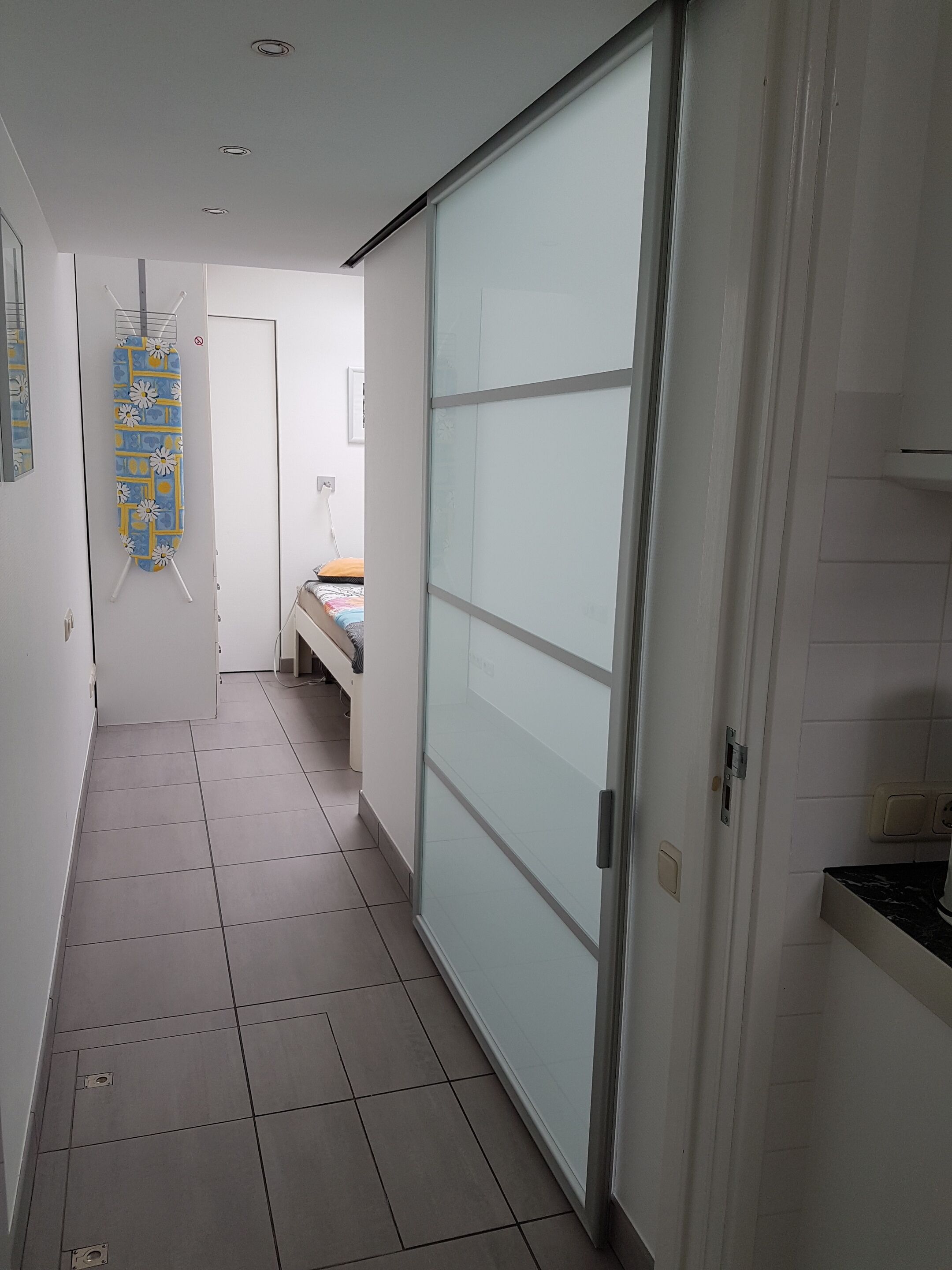 Sliding door to bathroom. door width 110 cm. Hall width 100 cm.