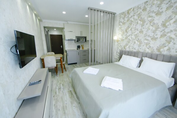 1 dormitorio, tabla de planchar con plancha, wifi gratis y ropa de cama