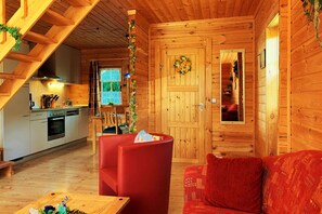 Een televisie, een dvd-speler, boeken en een stereo