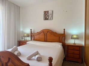 1 dormitorio, tabla de planchar con plancha, wifi gratis y ropa de cama