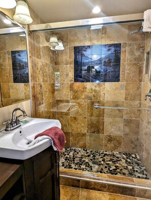 Shower, hair dryer, towels