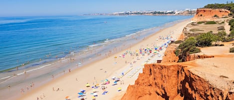 On the beach, beach towels