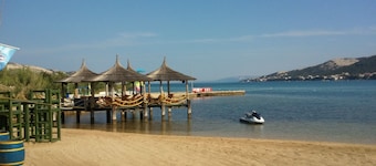plage appartement de vacances en famille dans la premiÚre rangée de la mer