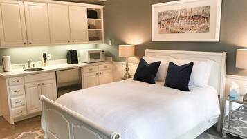 Camas con pillow-top, tabla de planchar con plancha y wifi