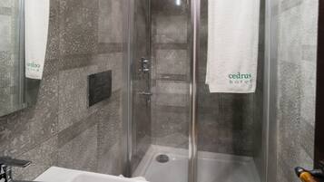 Shower, free toiletries, hair dryer, slippers