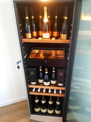 Wine storage unit with multiple shelves, perfect for organizing and accessing your collection.
