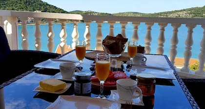 Sea view and seafront Villa Dolores in Tisno on the Dalmatian coast