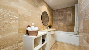 Combined shower/tub, hair dryer, towels, soap