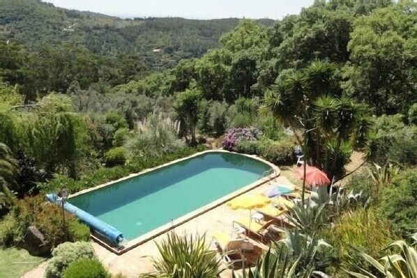 حمّام سباحة خارجي، حمّام سباحة مُدفَّأ