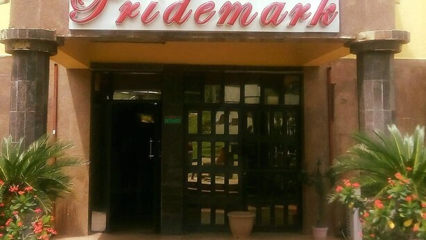 The exterior of a building with a sign that reads "Pridemark." - Pridemark Hotel (Abuja)