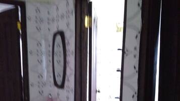 Shower, towels, soap, toilet paper