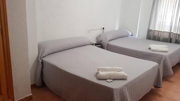 Blackout curtains, free WiFi, bed sheets