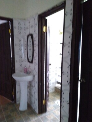 Shower, towels, soap, toilet paper