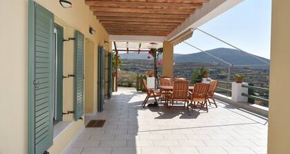 House with panoramic view in Syros