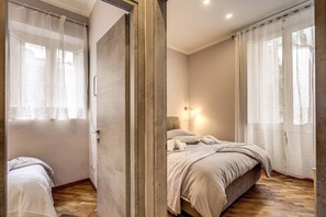 2 habitaciones, caja de seguridad en la habitación y escritorio 