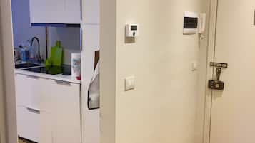 Fridge, stovetop, dishwasher, coffee/tea maker