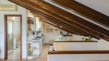 Apartemen, 2 kamar tidur | Dapur pribadi | Lemari es besar, microwave, oven, dan kompor