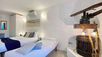 Traditional Room, 1 Bedroom, Hill View, Ground Floor | 2 bedrooms, down comforters, in-room safe, individually decorated