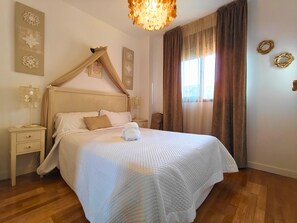 2 dormitorios, tabla de planchar con plancha, wifi gratis y ropa de cama