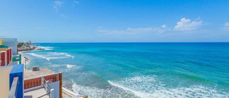 On the beach, sun loungers, beach towels