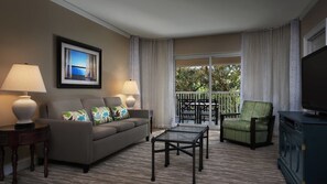 Relax in comfort with a sofa, armchair, and dining area.