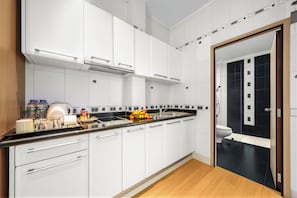 Familie studio | Luxe beddengoed, pillowtop-bedden, een kluis op de kamer