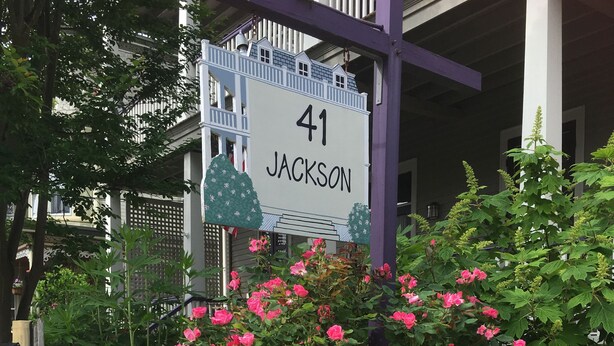 A house number sign with '41 JACKSON' and a garden with pink and white flowers. - Cozy 2 BR Apt in historic Cape May, NJ (Cape May)