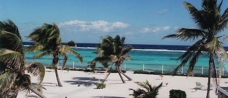 On the beach, sun-loungers, beach towels