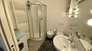 Shower, eco-friendly toiletries, hair dryer, bidet