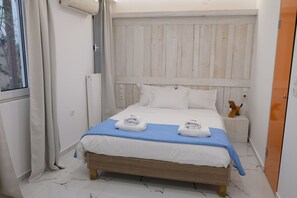 1 dormitorio, tabla de planchar con plancha, wifi gratis y ropa de cama