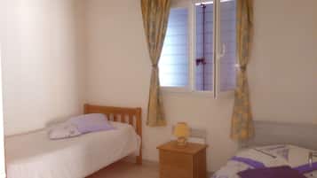 2 habitaciones, tabla de planchar con plancha, wifi y ropa de cama