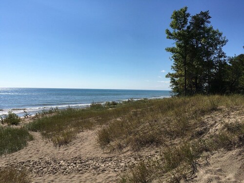 Experience Lake Michigan views from your cozy 3-bedroom retreat