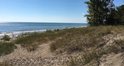 Experience Lake Michigan views from your cozy 3-bedroom retreat