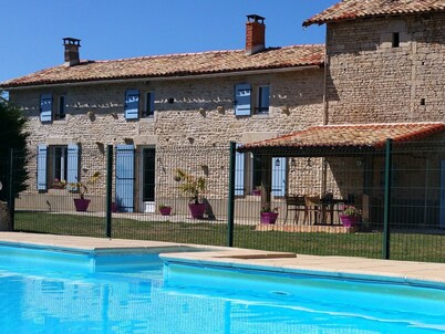 La Ballerie farmhouse & gîte. Heated pool and games barn in walled garden.