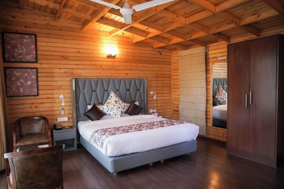 Super Deluxe Cottage Valley Facing | Luxe beddengoed, een minibar, een kluis op de kamer