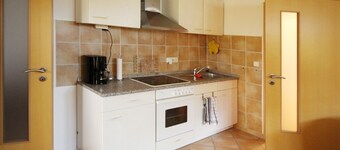 several lovingly furnished Wohnunfgen, small idyllic Dor