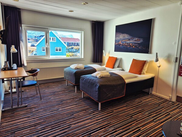 Premium bedding, down duvets, pillow-top beds, in-room safe