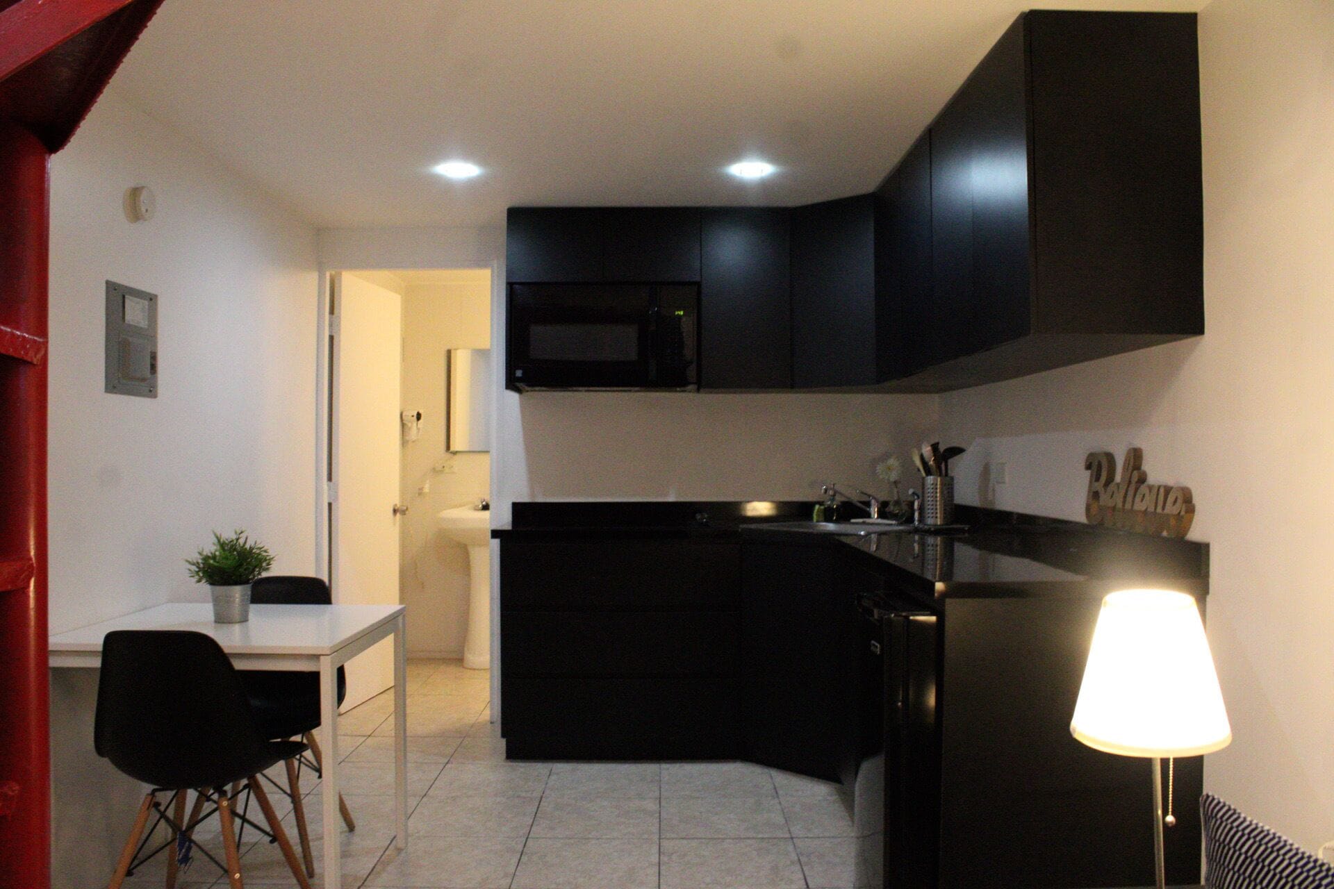 Fridge, microwave, stovetop, coffee/tea maker