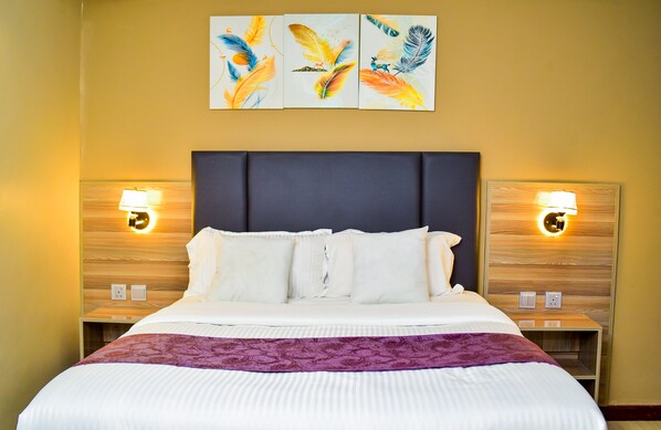 Executive Room | Desk, iron/ironing board, free WiFi, bed sheets