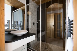 Bathtub, hair dryer, towels