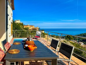 Outdoor dining - Villa with stunning sea views and pool in terrace. (Sa Riera)