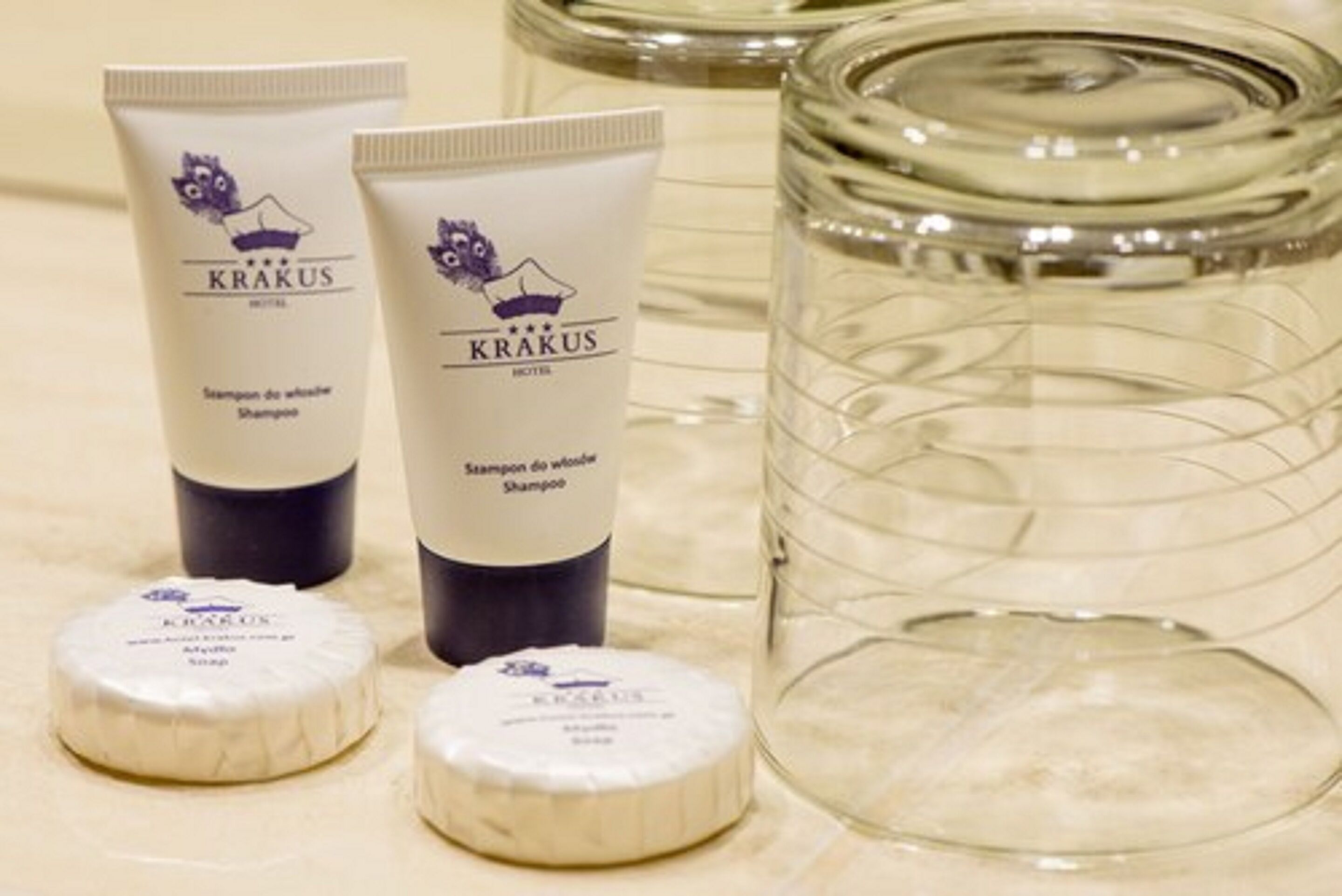 shower, designer toiletries, hair dryer, towels