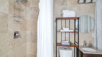 Bathtub, hair dryer, towels