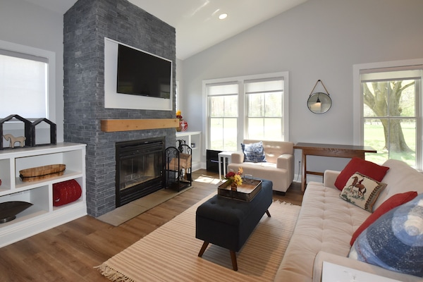 Warm up with a wood burning fireplace. Firewood included.